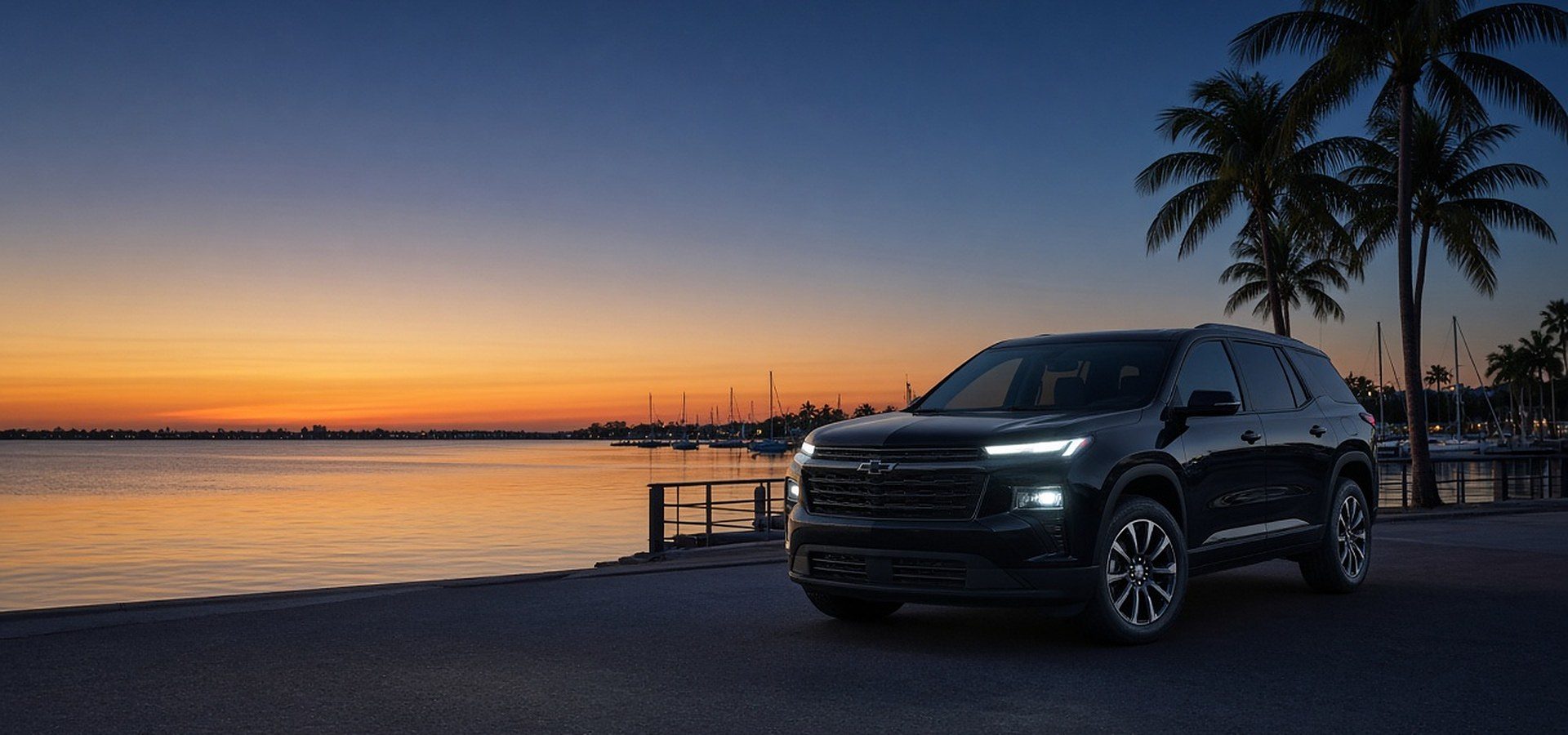 Black SUV on the Tampa Bay waterfront at dusk